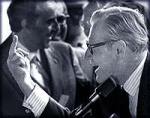 Governor Nelson A. Rockefeller giving inmates finger